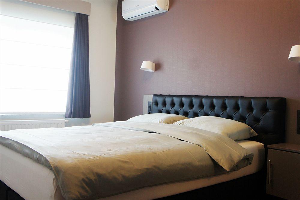 Belrom Hotel Синт-Тройден Екстериор снимка